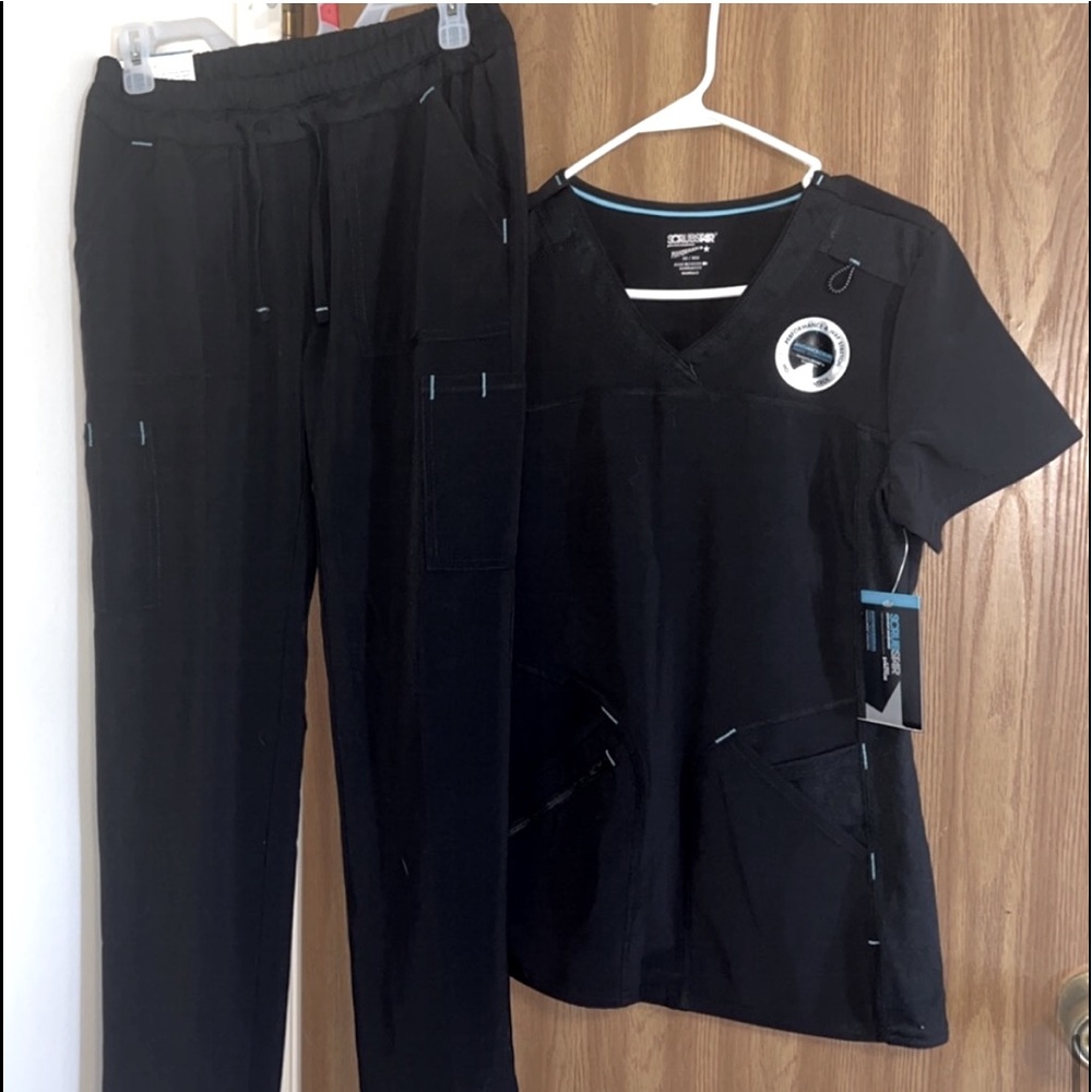 Brand new scrubs set size XS with tags